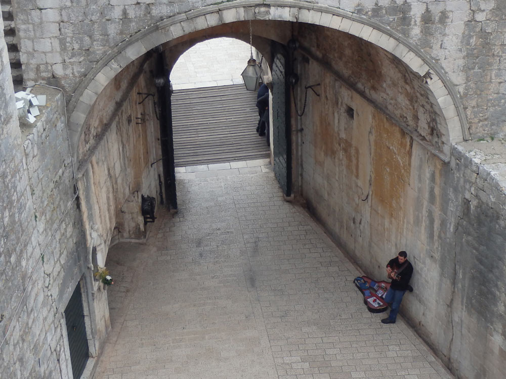 Pile Gate and guitar busker in Dubrovnik