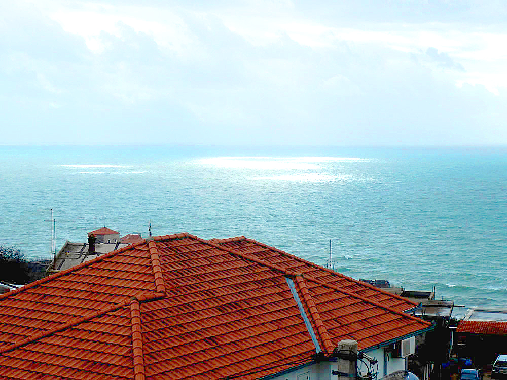 Sunny spots on the Adriatic Sea, as seen from the patio outside our room