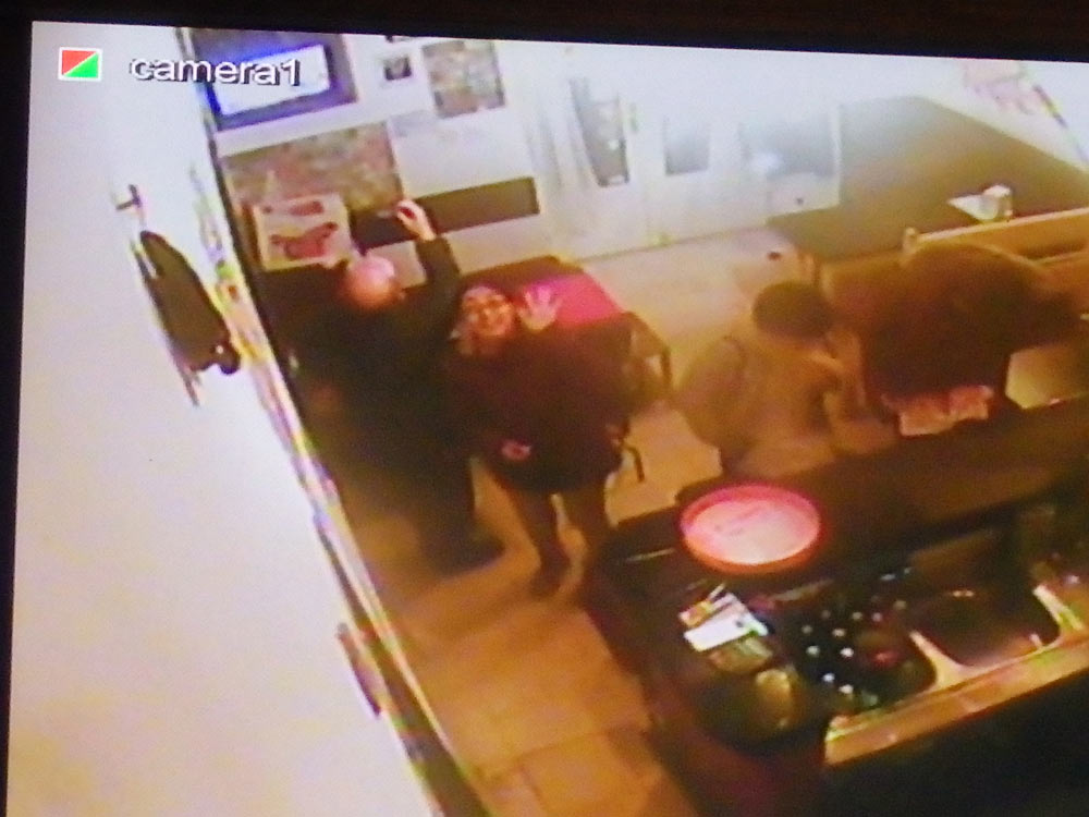 We showed up on the security camera screen in Škola sandwich shop!