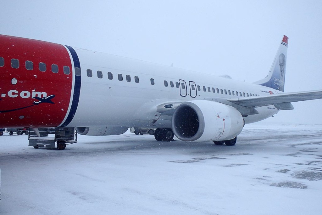 airplane-on-snowy-runway-norway