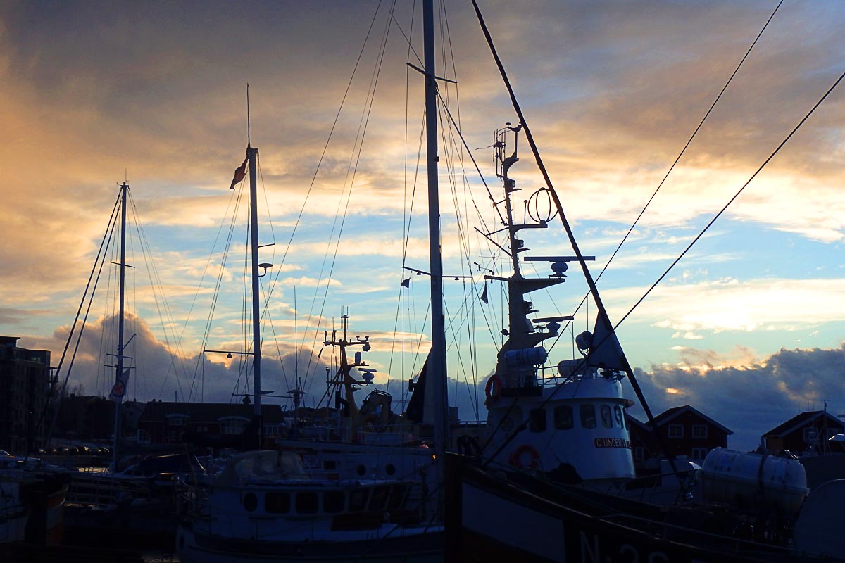 dark-boats-clouds-sky-bodo-norway