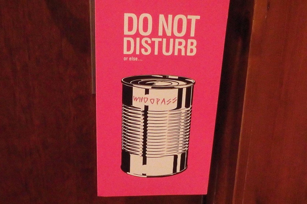 Do Not Disturb... or else you'll get a can of Whoopass. Comfort Hotel Park has a good, American sense of humor.