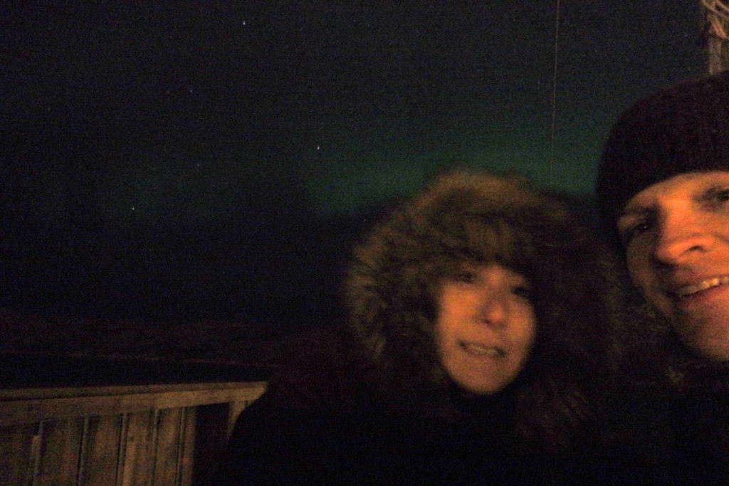 Cold but happy, with the Aurora shuffling around behind us.