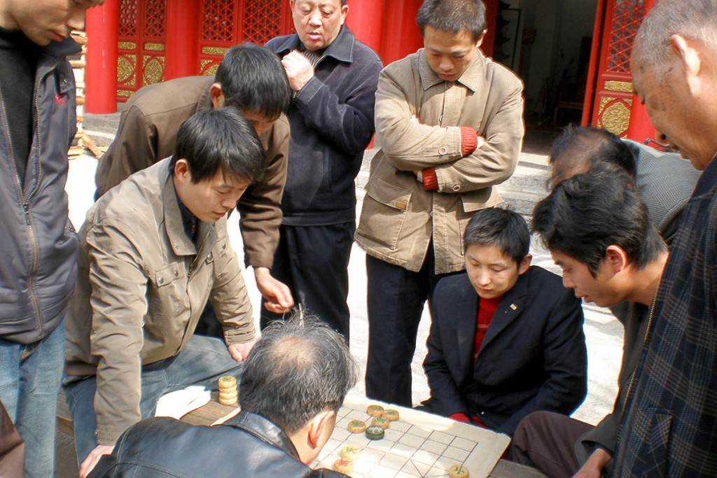 men-playing-board-game-xian-street