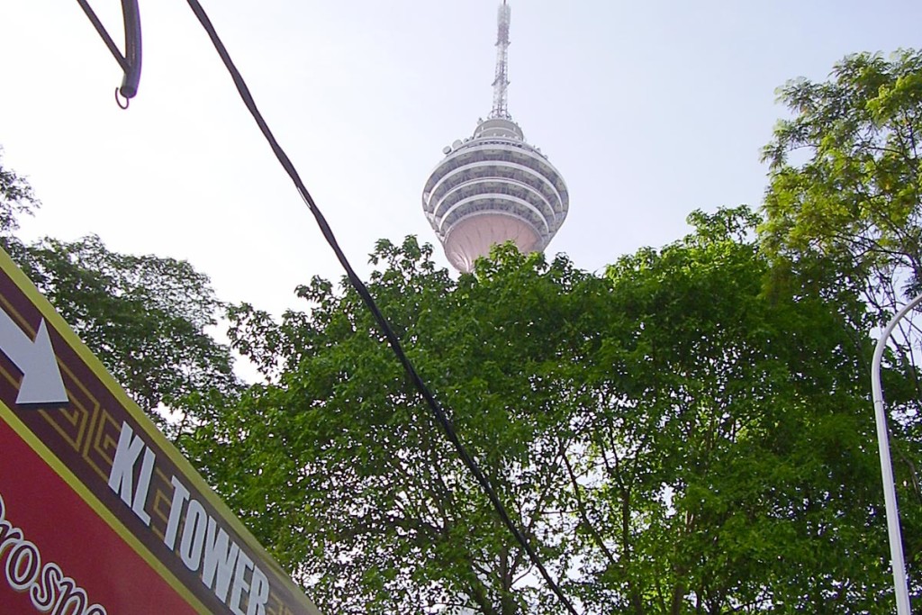 kl-tower-behind-trees-with-sign