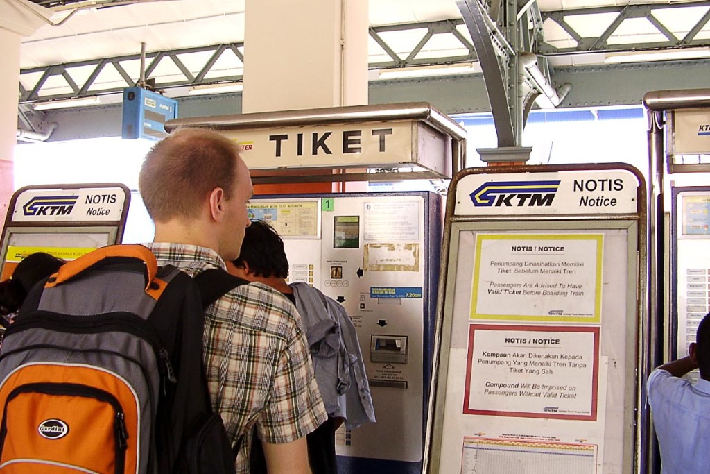 Buying tickets at Klang train station.