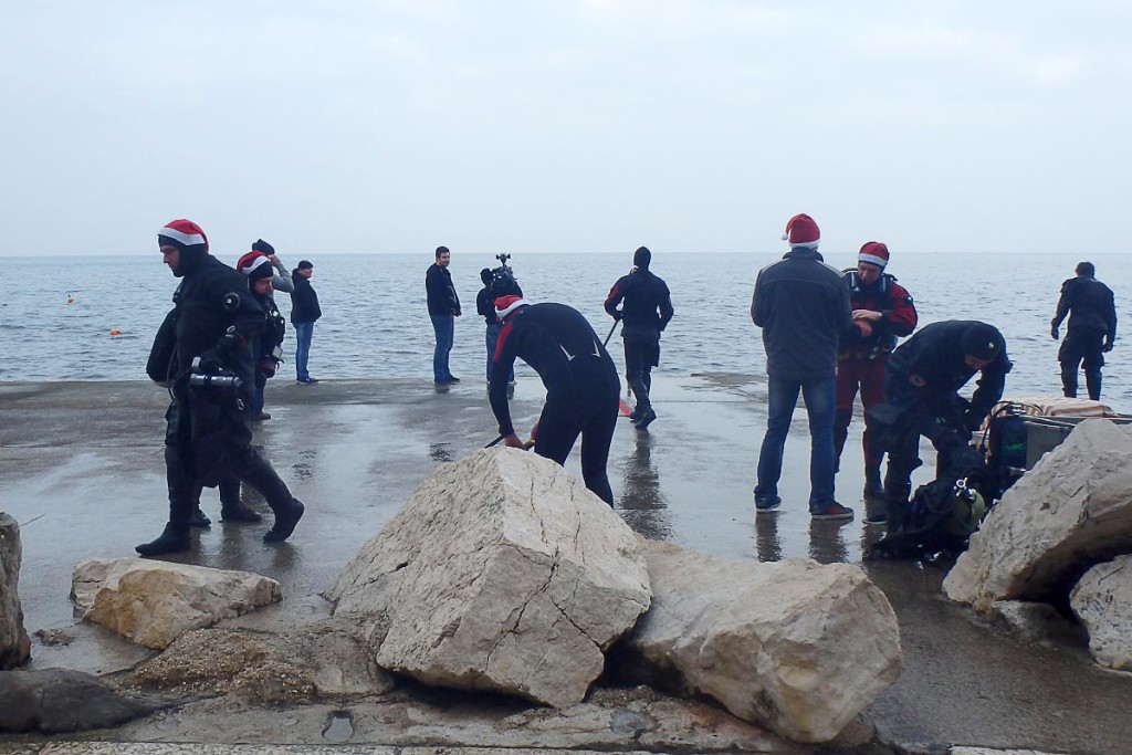 Scuba divers with Santa hats.