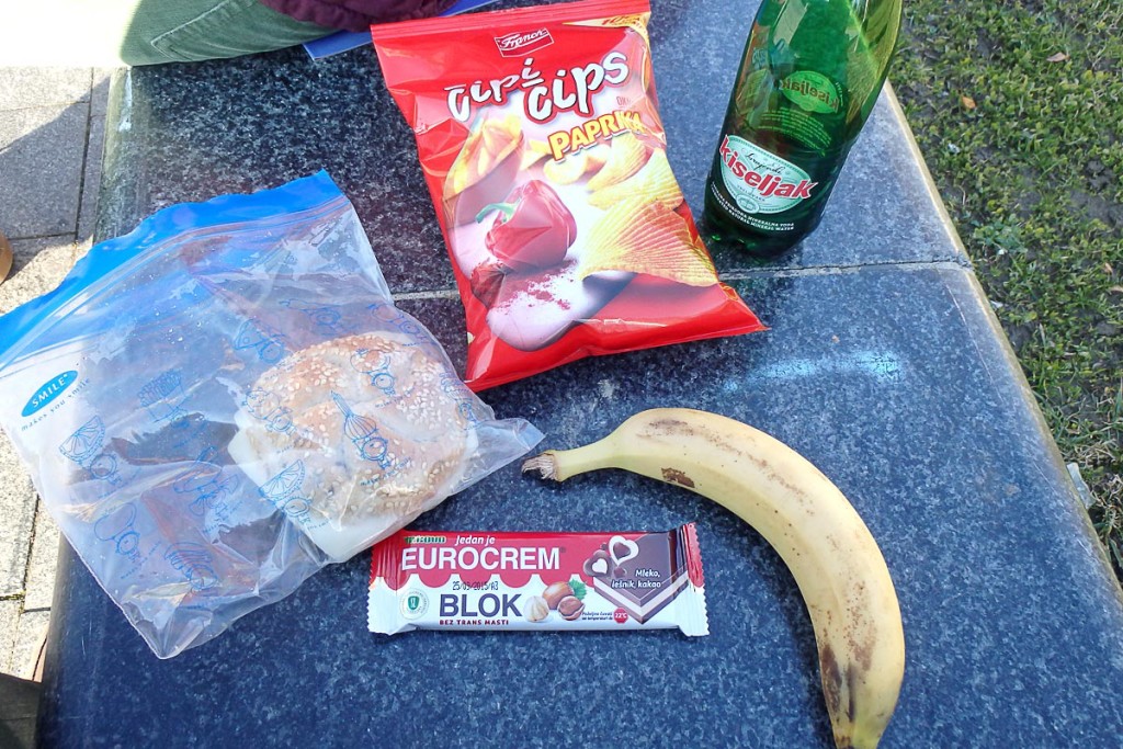 Banana and sandwich swiped from the breakfast buffet, plus chips and chocolate from a store. Nice picnic.