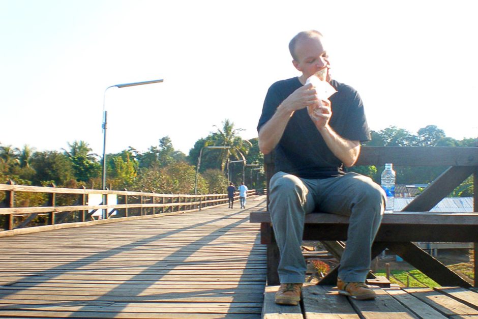 jeremy-eating-fried-snack-on-mon-bridge-sangkhlaburi