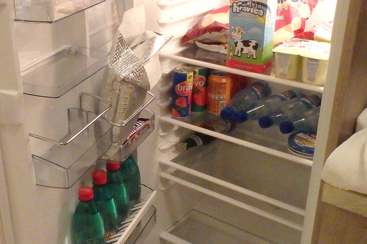 Refrigerator in Podgorica with minibar snacks. Insulin in the foil bag in the door.
