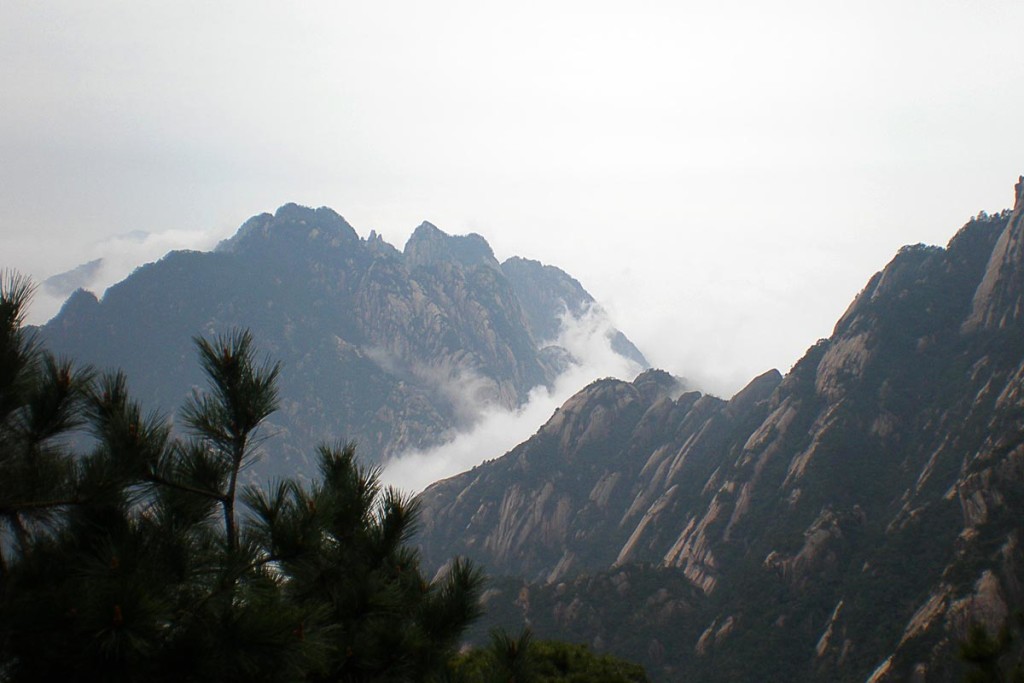 mountains-clouds-white-sky-huangshan-china