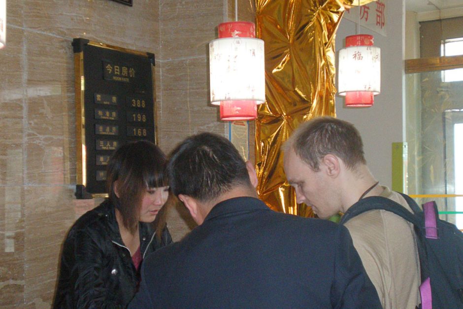 jeremy-checking-in-hotel-xining-china