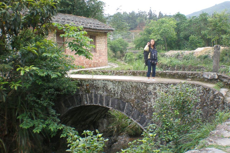 masayo-on-bridge-near-tulou-fujian-china