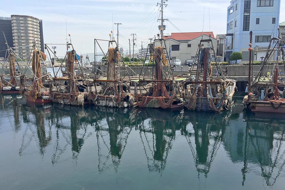 row-of-fishing-boats-harbor-akashi-japan