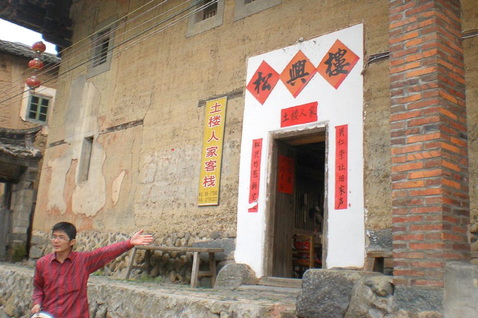 One of the hotel owners in front of the hotel.