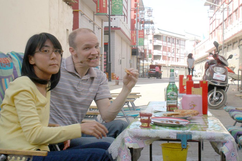 Lamb skewers, round bread, and big beer – a perfect western Chinese meal.