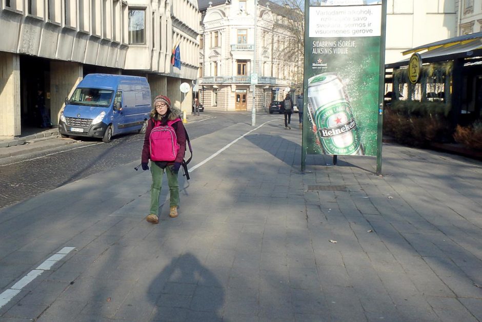 Masayo struggles through Vilnius with heavy bags.