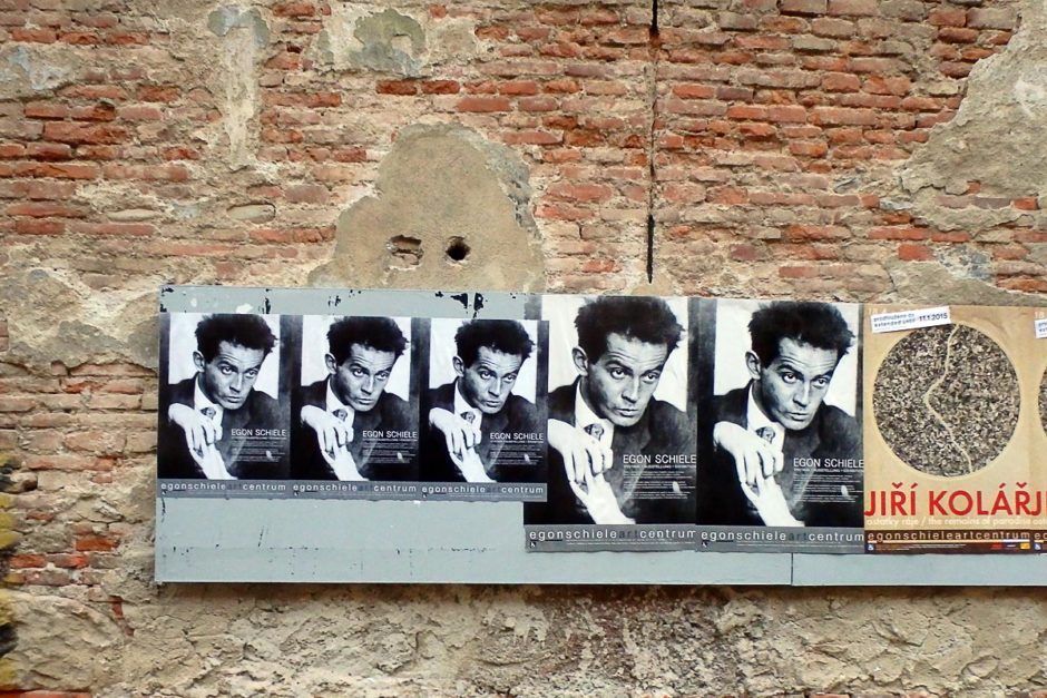 egon-schiele-posters-on-brick-wall-cesky-krumlov