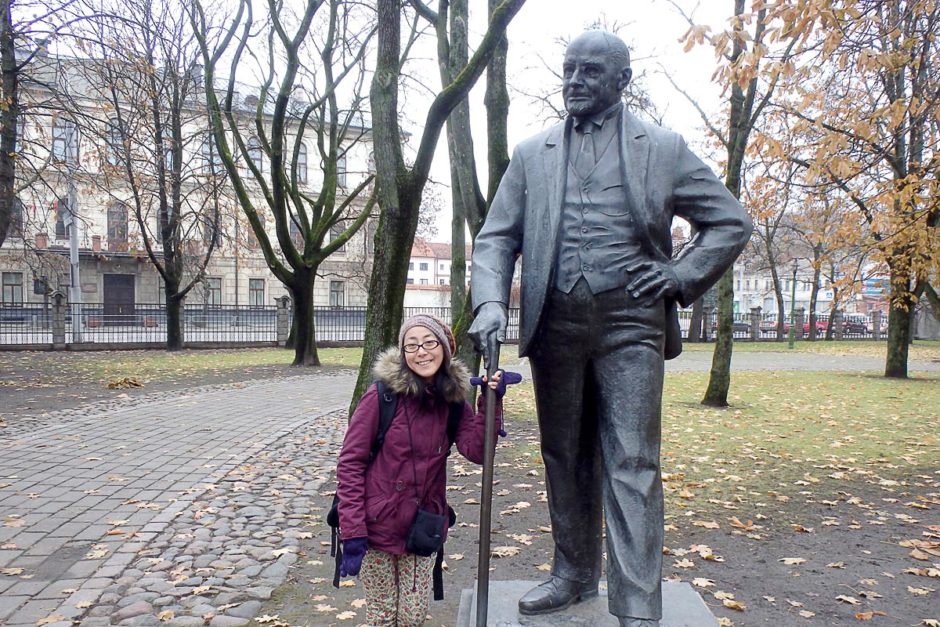 masayo-posing-with-statue-kaunas-park-lithuania