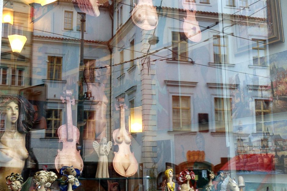 naked-lady-violin-building-window-reflection-prague