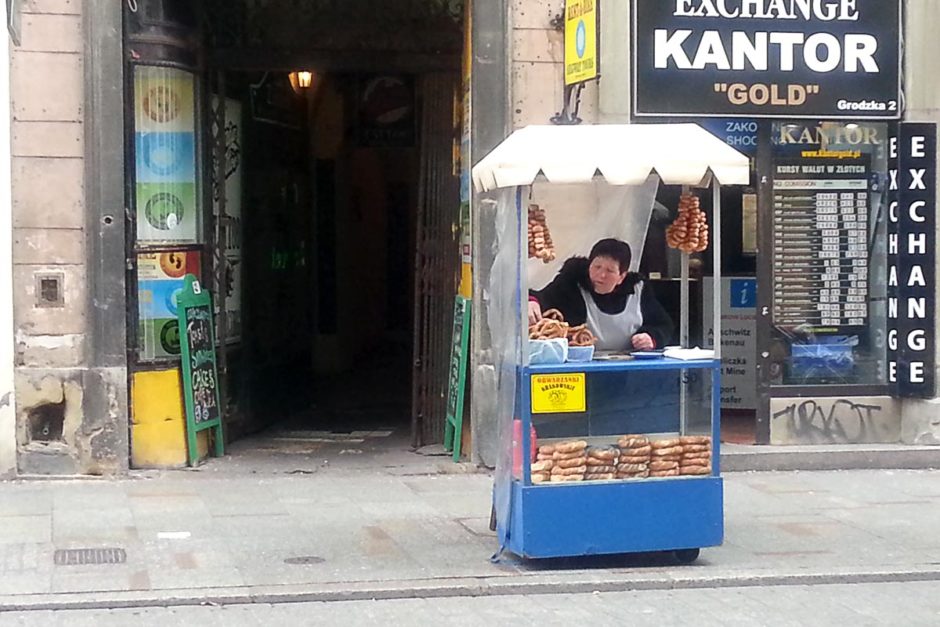 woman-selling-bread-krakow-poland-street