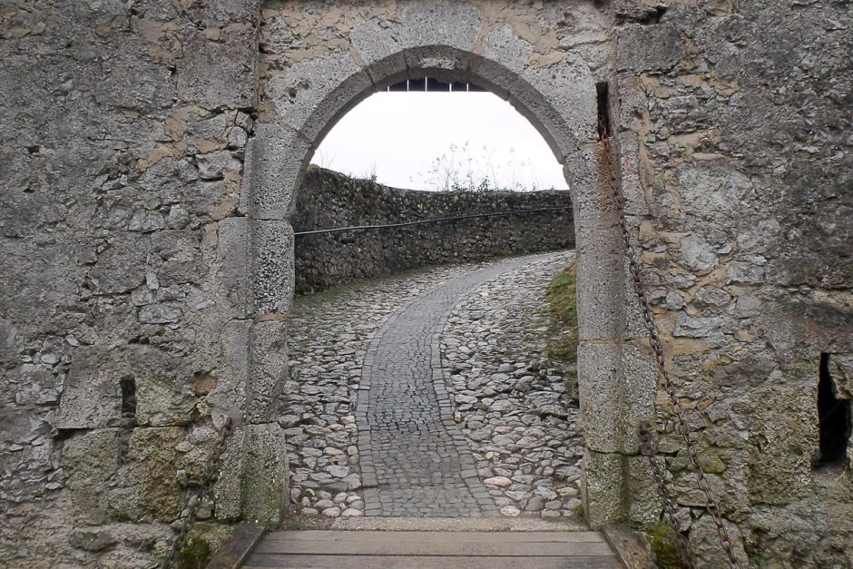 bled-castle-stone-arch-door-path