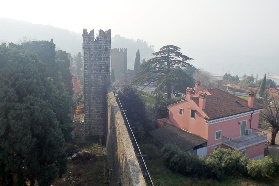 piran-town-wall-misty-mountain-houses-view