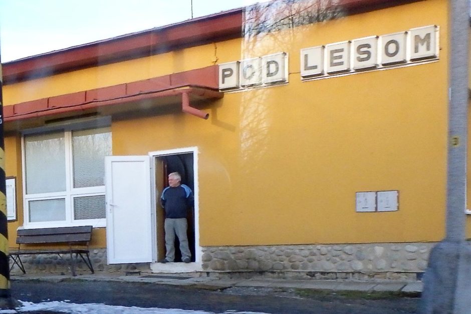 pod-lesom-station-slovakia-man-doorway