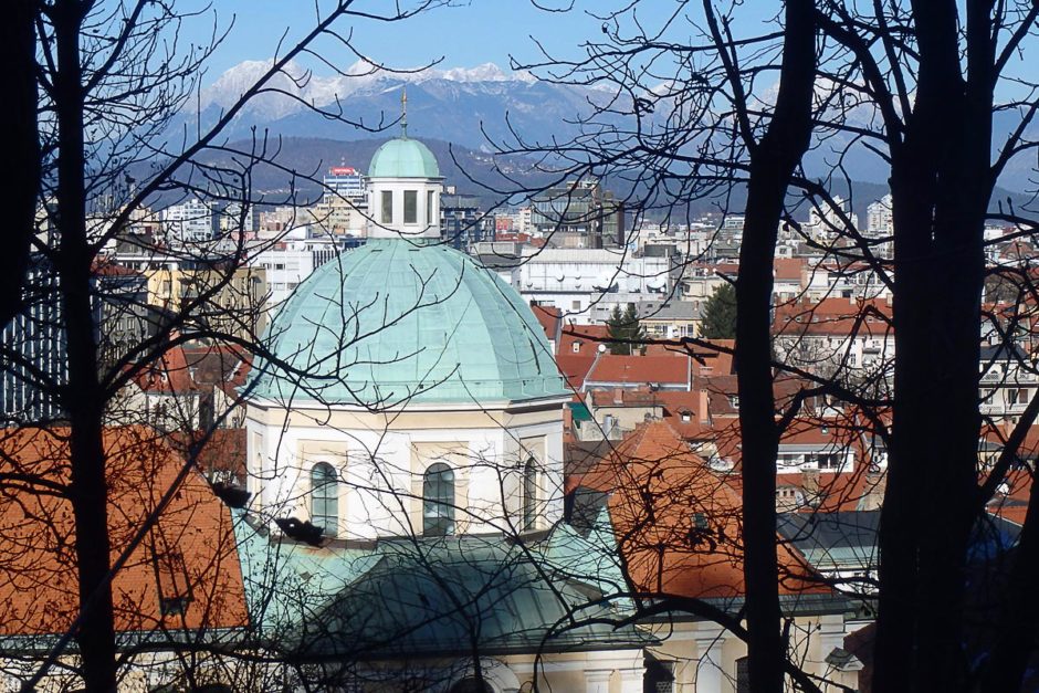 turquoise-dome-red-roofs-snow-mountain-ljubljana